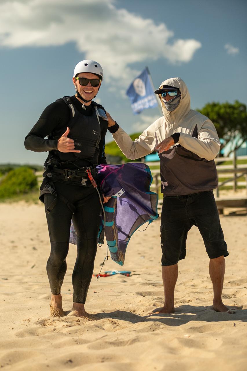 Kitesurf student and instructor discussing conditions before a lesson at Liam Whaley Pro Center in Tarifa