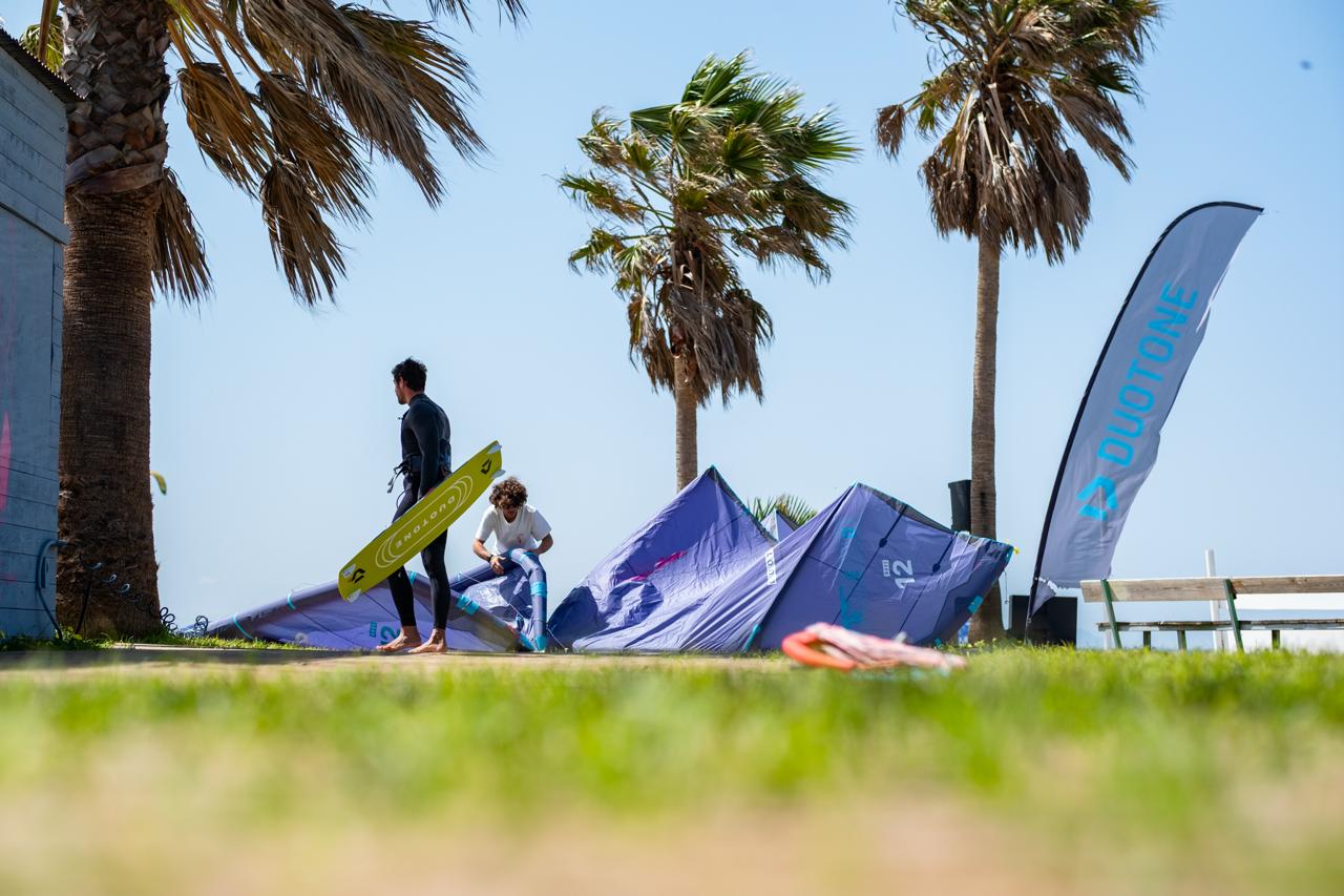Students preparing kitesurfing equipment at Liam Whaley Pro Center in Tarifa before a lesson